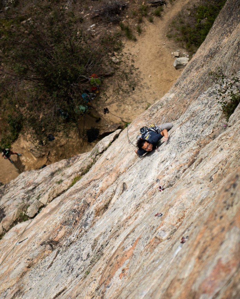 Rock climber on a sport route in Skaha Bluffs
