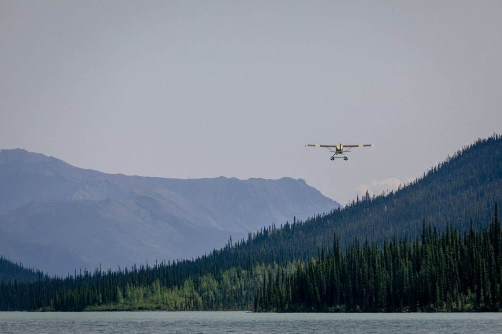 a float plane flying away
