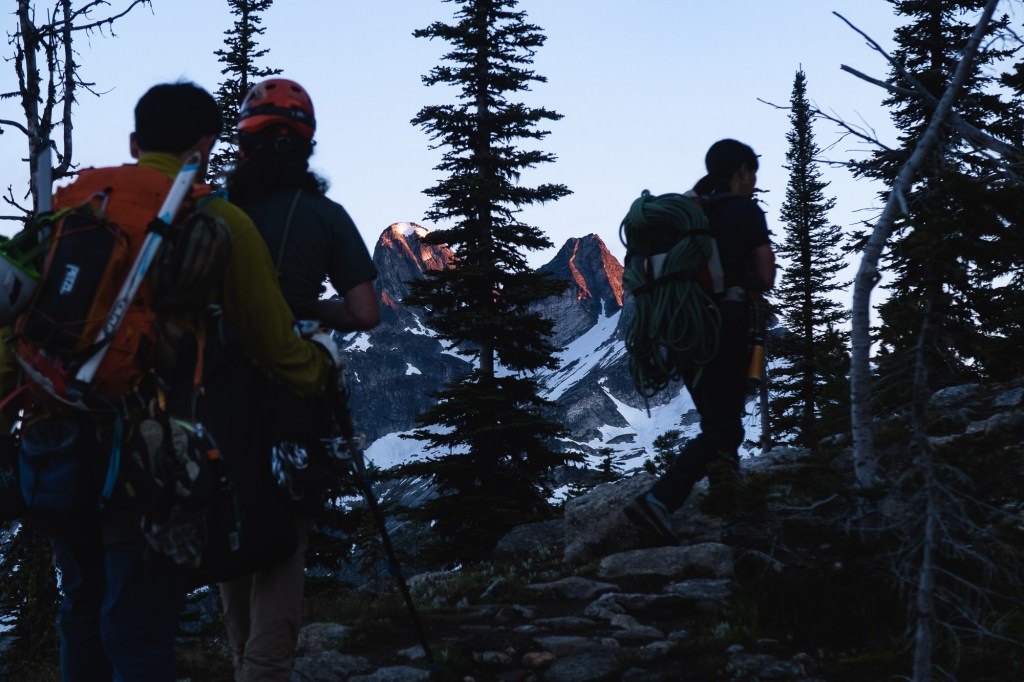 Golden hour morning alpine glow light hitting peaks in Valhalla provincial park in July