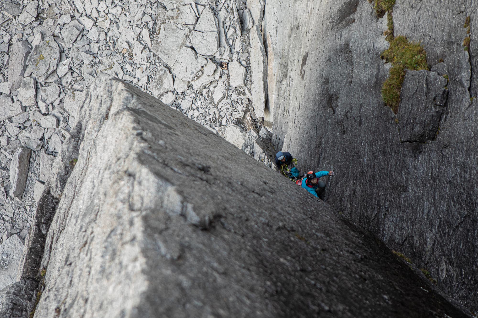 Yuki leading left facing corner climbing