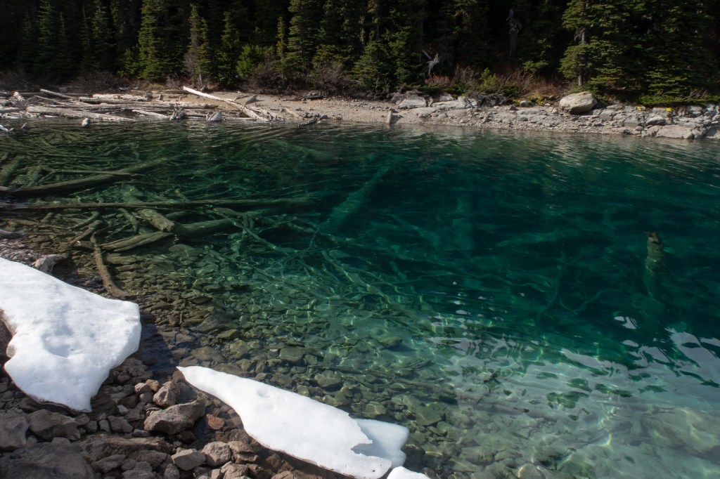 Close up photo of clear blue glacial water at Garibaldi Lake near Squamish British Columbia