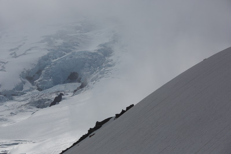 Massive active crevasses and alpine ice falls running down the slopes of Emmons Glacier on Mount Rainier